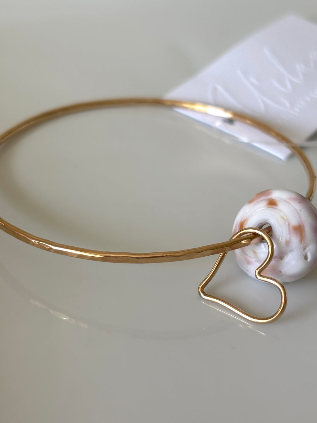 PUKA SHELL HEART CHARM BANGLE